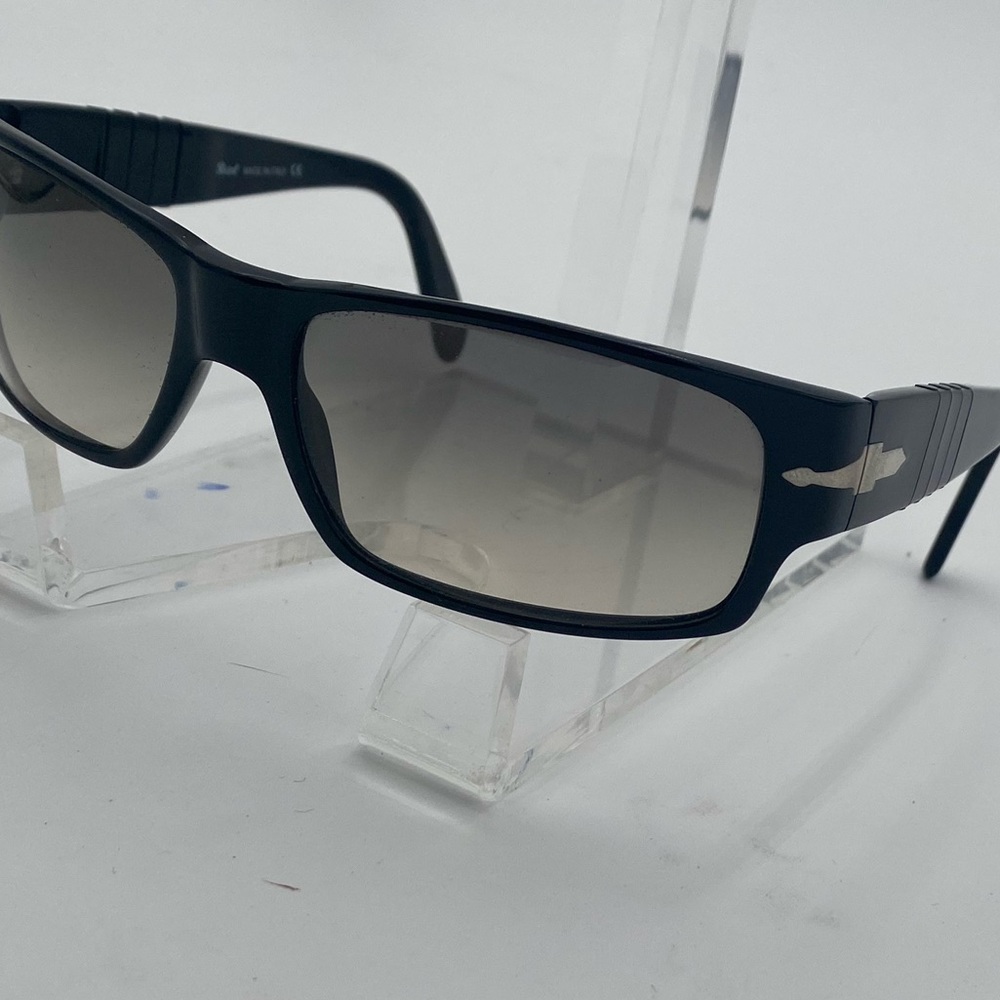 Black PERSOL sunglasses with gradient lenses.